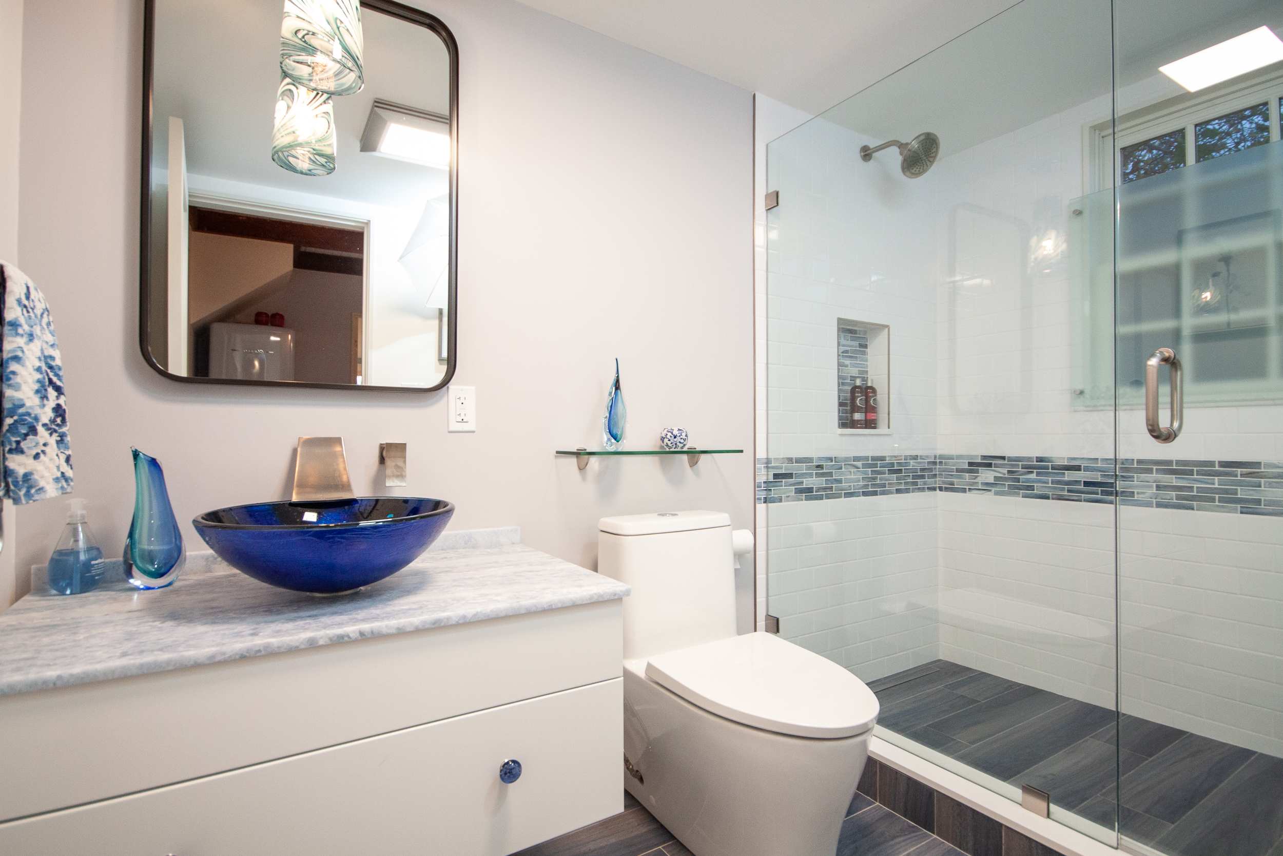 bathroom remodel with glass shower, vessel sink vanity, and custom tile on the North Shore”